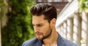 Medium length swept back side part has a professional and serious mien