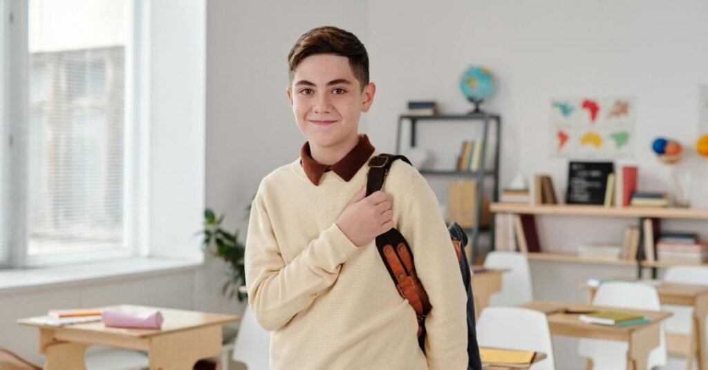 Boy with a classic side part haircut showing a neat and clean hairstyle suitable for school and everyday look